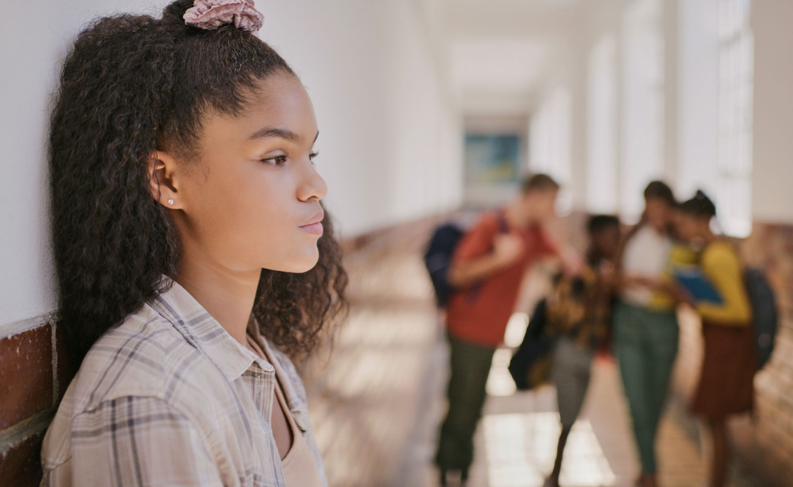 A photo of two teenagers arguing with each other.