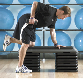 A person doing a step exerciseDescription automatically generated