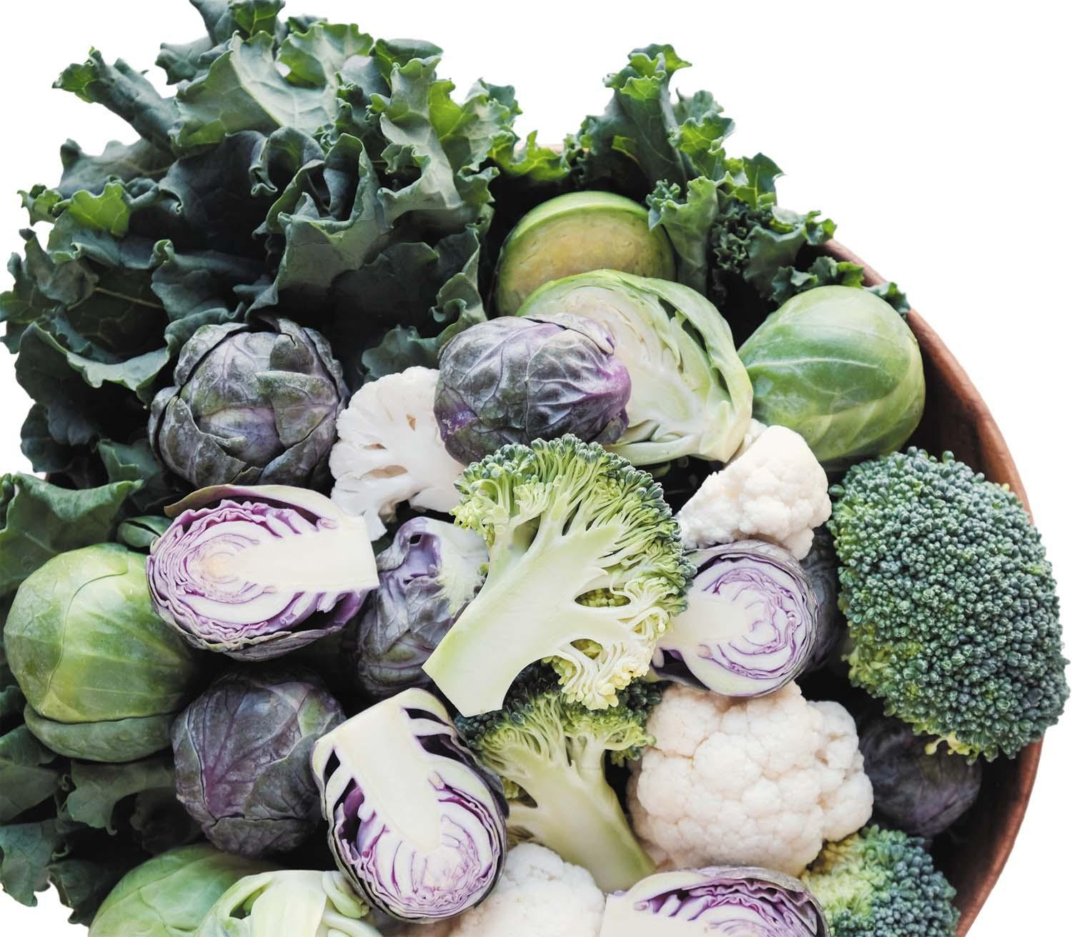 A bowl of cruciferous vegetables including broccoli, Brussels sprouts, and cauliflower.