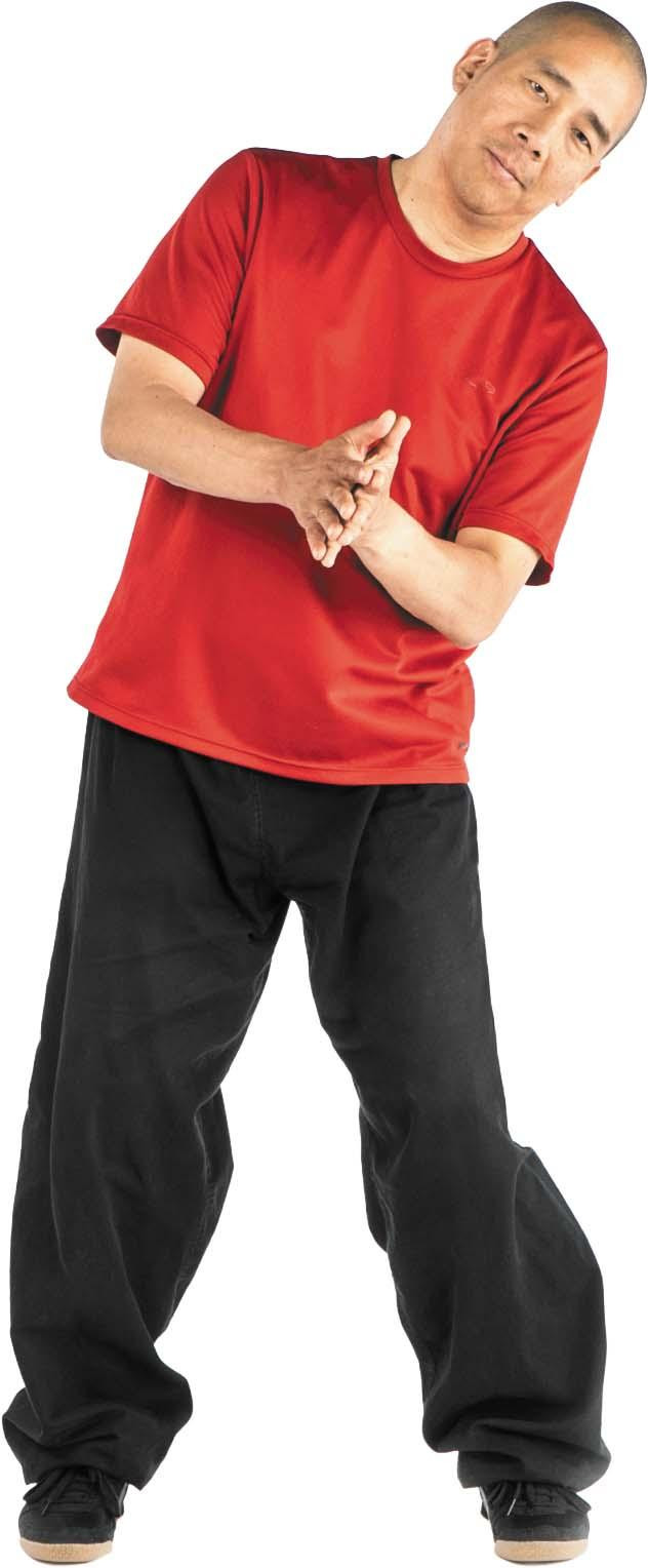 A man performs the second part of the dragon wags its tail exercise as described in the article.