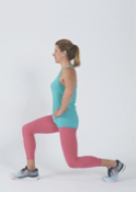 A woman performs the second part of the forward lunge exercise as described in the article.