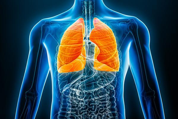 Three-dimensional illustration of a human body in blue on a black background, with the lungs highlighted in glowing orange.