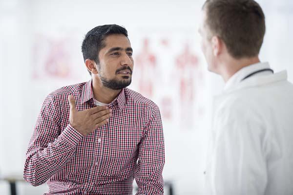 Can you safely taper off a proton pump inhibitor if reflux symptoms improve?