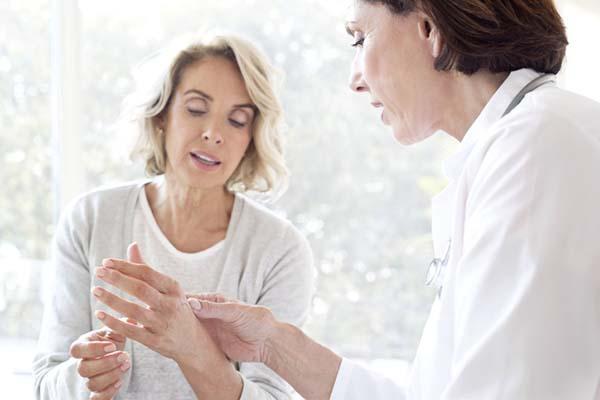 What conditions can cause peeling skin on the fingers and hands?
