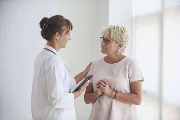 When do I need to stop using hormone therapy?