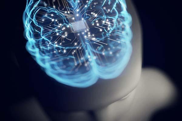 Photo illustration on a black background of a glowing blue brain with a CPU chip and circuits; the concept is artificial intelligence.