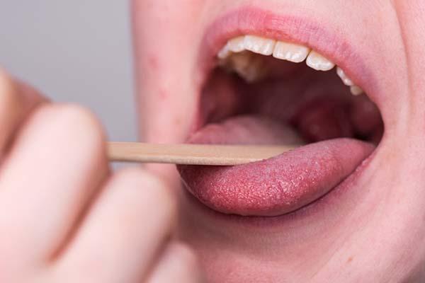 What could a persistent salty taste in the mouth mean?