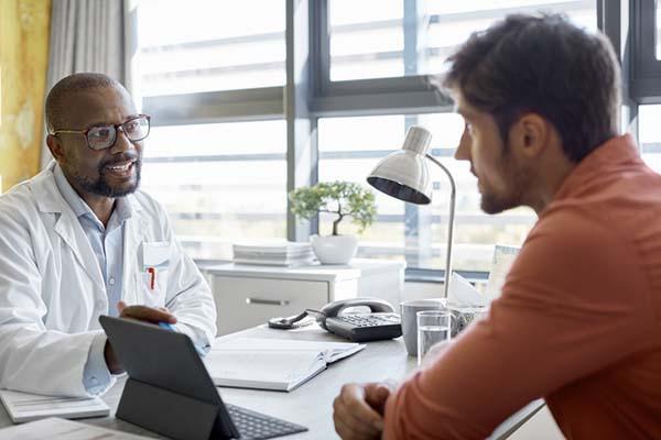 Which specialist treats a blocked ureter?