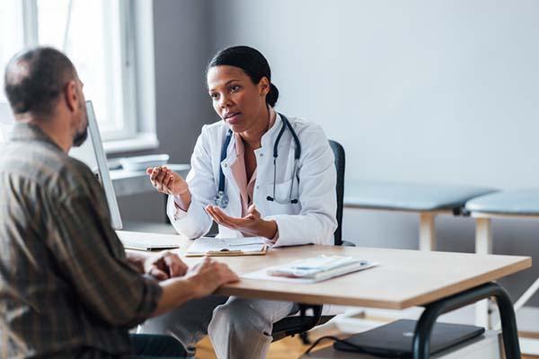 What can help ease orthostatic tremor?