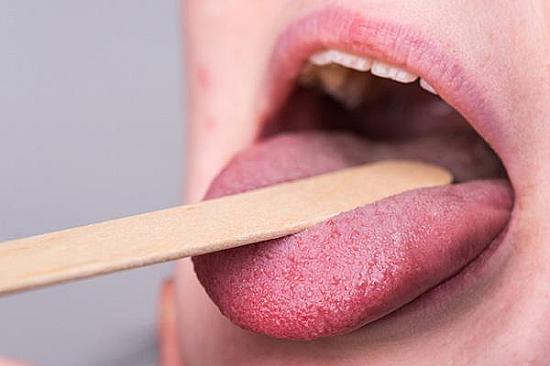 What can cause a red, tingling tongue? featured image