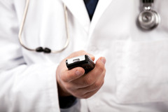 Doctor-with-mobile-phone