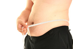 Man-measuring-his-belly