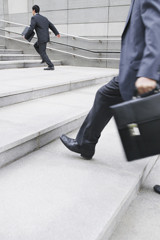 Businessman-running-stairs