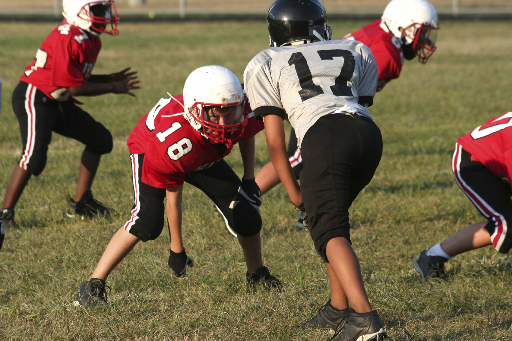 boy playing american football