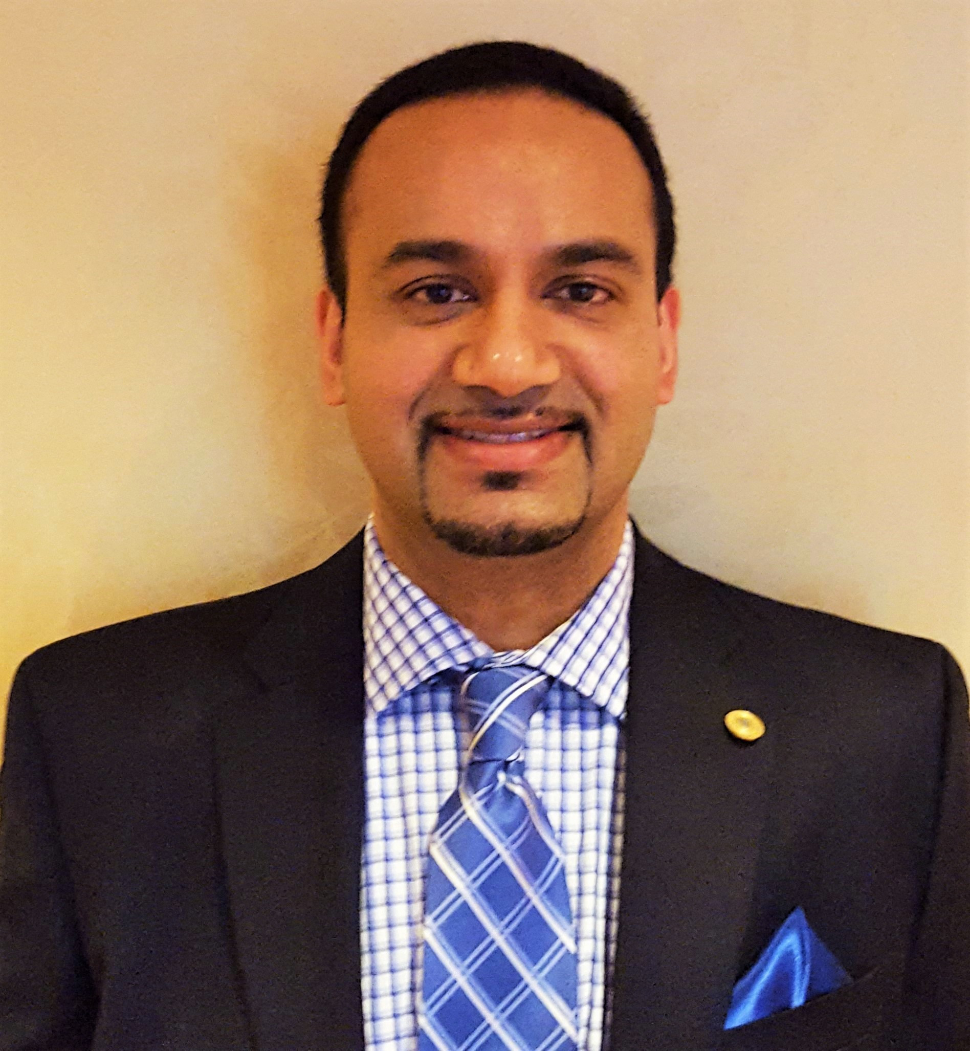 photo of Paul G. Mathew, MD, FAAN, FAHS